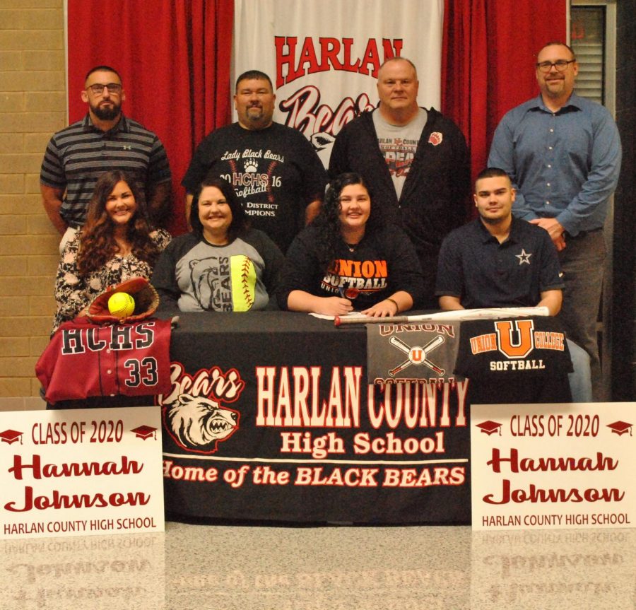 Harlan+County%E2%80%99s+Hannah+Johnson+signed+recently+to+continue+her+softball+career+at+Union+College.+Pictured+with+Johnson+are+her+parents%2C+Everett+and+Lori+Johnson%3B+her+siblings%2C+Reagan+and+Shawn%3B+HCHS+assistant+principals+Eddie+Creech+and+Mike+Hensley+and+HCHS+coach+Tim+McElyea.