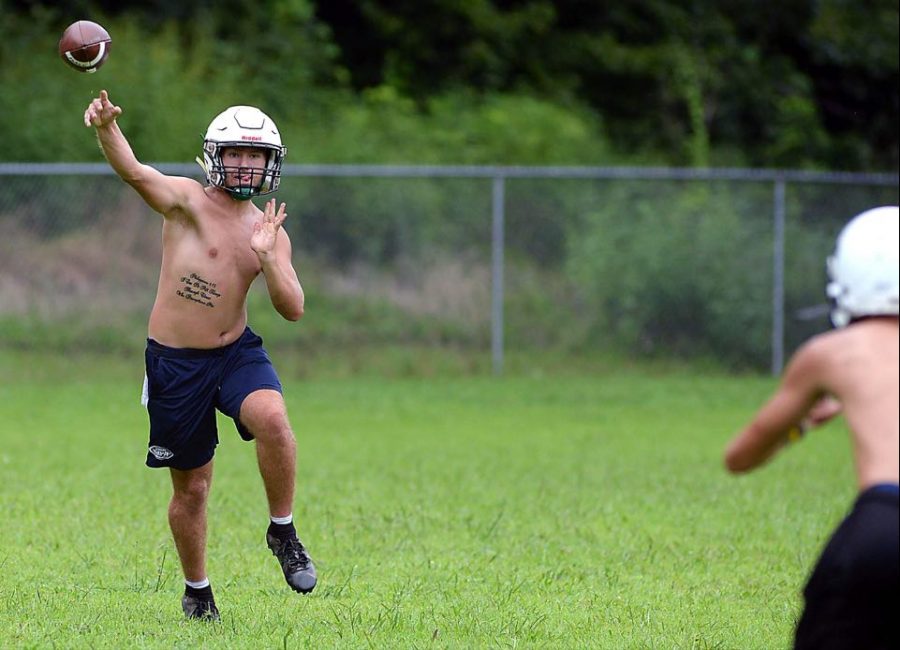 Harlan+quarterback+Connor+Scearse+released+a+pass+during+a+practice+session+in+the+summer.