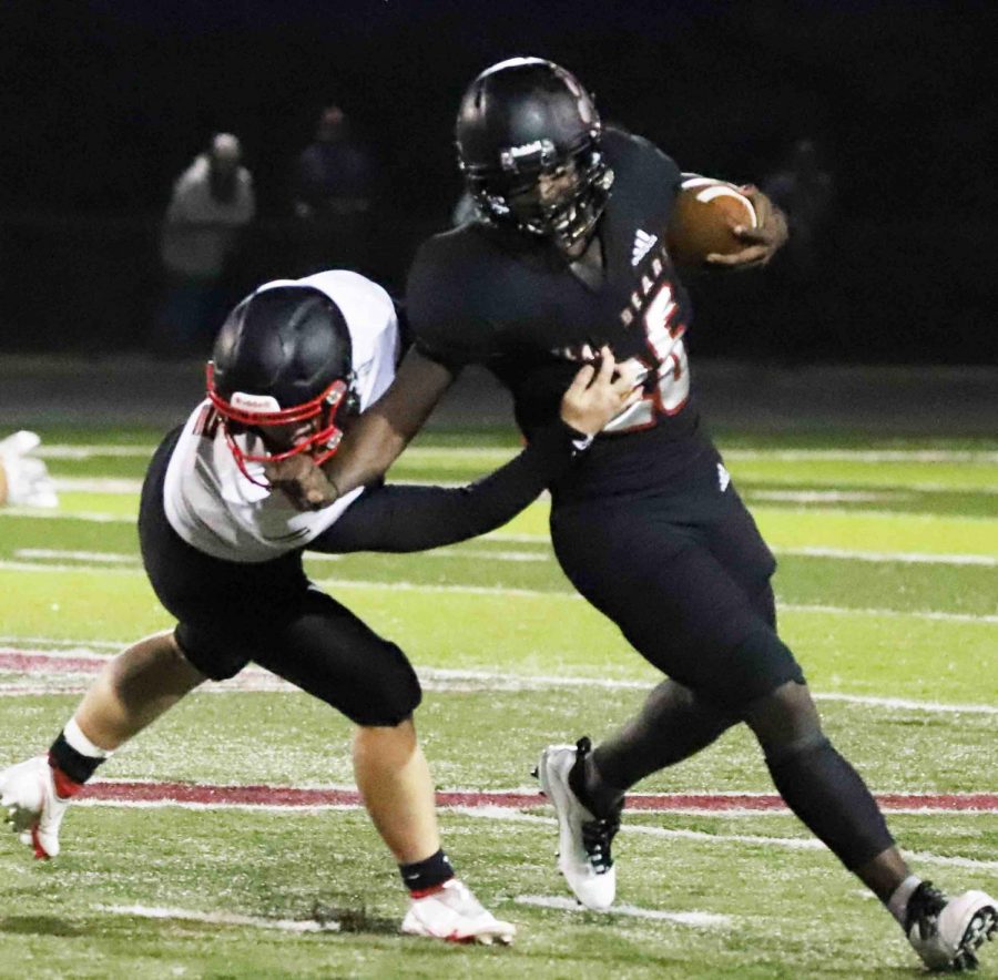Harlan+County+running+back+Demarco+Hopkins%2C+pictured+in+action+earlier+this+season%2C+scored+four+touchdowns+in+the+Bears+win+over+Clay+County+on+Friday.