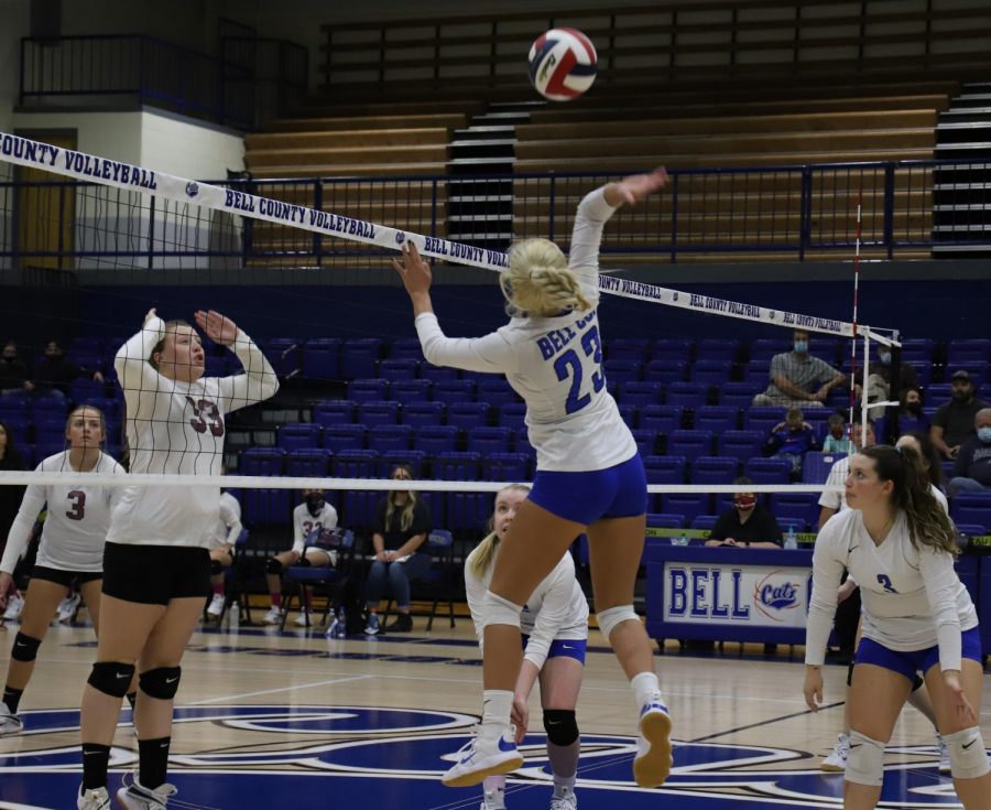 Bell+County%E2%80%99s+Makenna+Lefevers+went+airborne+at+the+net+as+Harlan+County%E2%80%99s+Lindsey+Browning+prepared+for+a+block+in+championship+game+action+Tuesday+in+the+52nd+District+Tournament.%0A