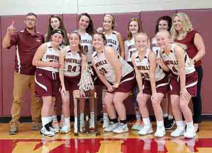 Pineville captured the All A Conference title in the seventh- and eighth-grade division with a 44-22 win Thursday over Harlan. Team members include, from left, front row: Kamryn Evans, Lexi Hoskins, Alyssa Howard, Mackenzie Caldwell and MaKayla Caldwell; back row: coach Robert Daniels, Ava Arnett, Rachel Howard, Kamryn Biliter, Malley Smith, Gracie Asher and coach Kim Yates.