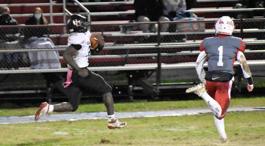 Harlan Countys Demarco Hopkins broke free for a 58-yard run in Fridays game at Anderson County.