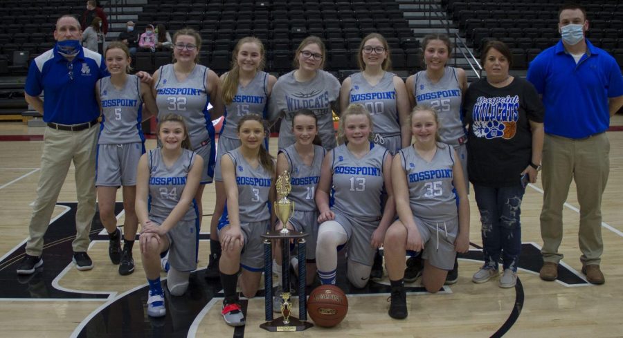 The Rosspoint Lady Cats claimed the county seventh- and eighth-grade championship Saturday with a 45-30 victory over Evarts. Team members include, from left, front row: Addison Gray, Braylee Engle, Sophie Day, Lindsey Skidmore and Aubrey Hensley; back row: head coach Rob McHargue, Peyton Lunsford, Kaitlyn Daniels, Brianna Howard, Sienna Cox, Serissa Cox, Harleigh Vanover, bookkeeper Kim Hensley and assistant coach John Simpson.