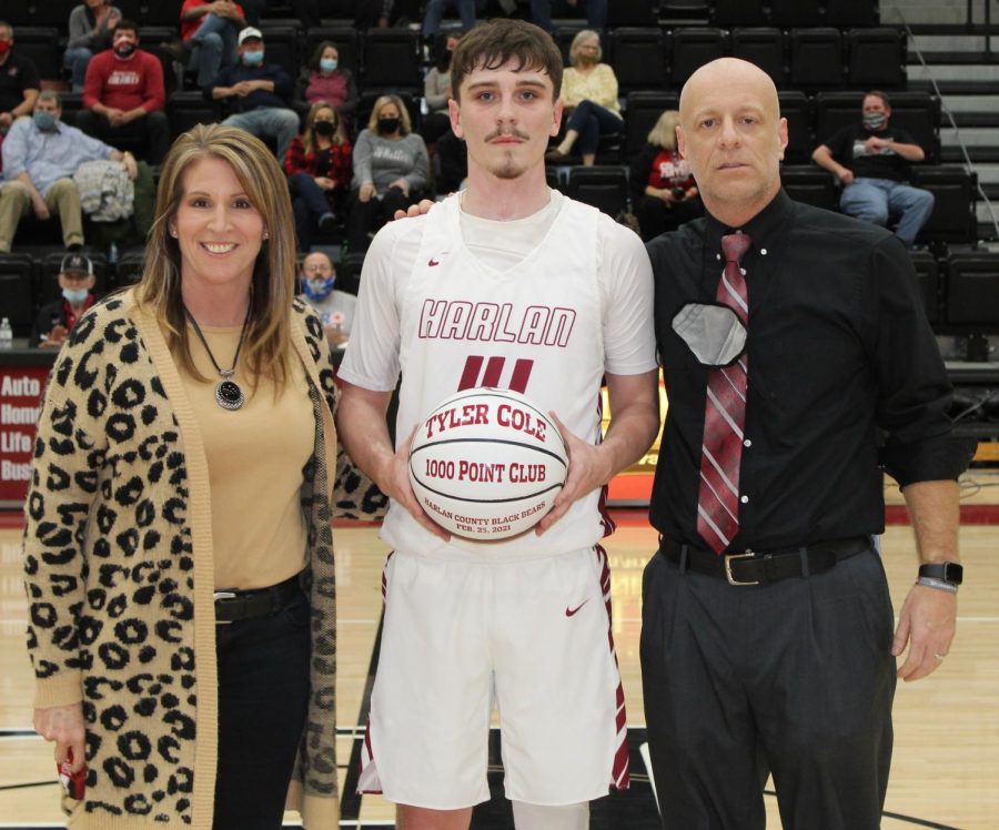 Harlan+County+senior+Tyler+Cole+was+honored+during+Thursdays+game+against+visiting+Whitley+County+after+becoming+the+seventh+member+of+the+schools+1%2C000-point+club.+Cole+is+pictured+with+HCHS+Principal+Kathy+Minor+and+coach+Michael+Jones.