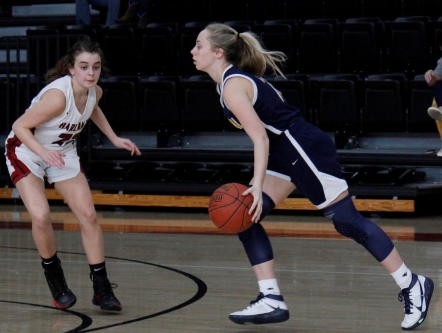 Knox+Central+senior+guard+Presley+Partin+drove+against+Harlan+Countys+Kylie+Jones+in+Saturdays+game.+Partin+scored+24+points+in+the+Lady+Panthers+56-55+win.