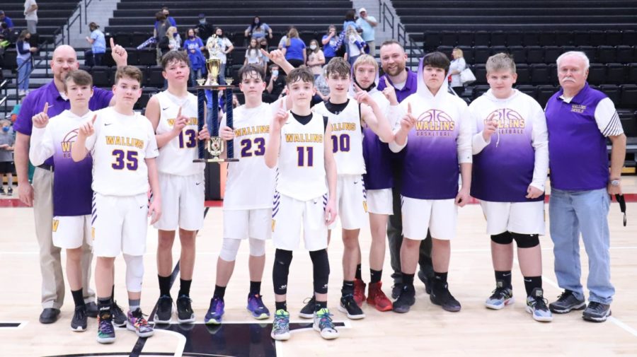 The+Wallins+Purple+Devils+completed+a+perfect+season+and+won+the+county+championship+in+the+seventh-+and+eighth-grade+division+by+defeating+Rosspoint+64-60+on+Tuesday+at+Harlan+County+High+School.+Team+members+include%2C+from+left%2C+coach+Robert+Simpson%2C+Keaton+Simpson%2C+Ethan+Simpson%2C+Hunter+Napier%2C+Evan+Simpson%2C+Trenton+Cole%2C+Connor+Daniels%2C+Tatten+Rice%2C+coach+Johnny+Murphy%2C+Travis+Burkhart%2C+Aaron+Johnson+and+coach+Robert+Simpson.