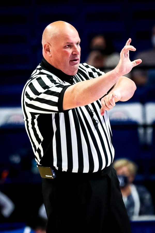 Harlan County resident Darrell Wilson is one of the officials representing the 13th Region at this years girls state tournament at Rupp Arena. Wilson is pictured making a call during the Anderson County/Southwestern game on Wednesday night.