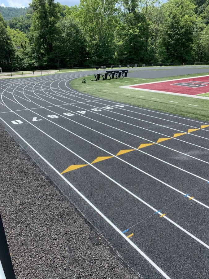 Midwest Track Builders, of Chicago, recently completed an entire resurfacing project at Coal Miners Memorial Stadium on the campus of Harlan County High School. “A huge amount of credit goes to Mr. Brent Roark and the Harlan County Board of Education for approving a project of this magnitude,” said HCHS athletic director Eugene Farmer. “Although well-maintained, the track needed the resurfacing which provides a softer, more gentle surface for our student-athletes to compete on. This project was years in the making and when you think about track resurfacing nationwide, it really doesn’t get any more quality than Midwest Track Builders. I’m certainly pleased for both our student-athletes and coach Vitatoe, who always does a first-class job leading our track and field teams.”