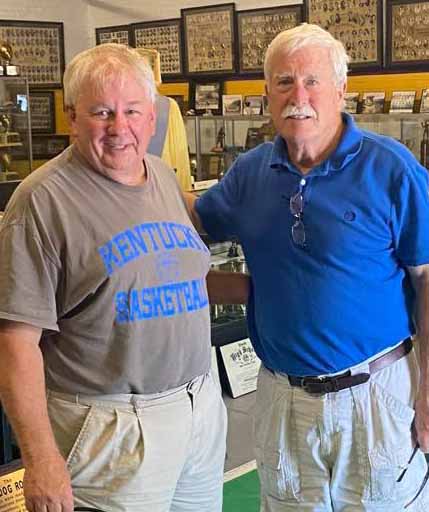 Mac Quarles (right) made a stop at the Bulldog Room in Lynch earlier this week and toured the facility with Mike O’Bradovich, a former Lynch athlete who helped collect the memorabilia focusing on Lynch High School sports history. Quarles is pictured with Lynch resident Roger Wilhoit. Quarles was head coach of the Bulldogs in 1977 and 1978 and was an assistant under John Morgan on the last Lynch football team in the fall of 1979. Lynch closed at the end of the 1981 school year. WIlhoit and Quarles played against each other in the 1968 Class A state finals at Stoll Field in Lexington when the Bulldogs defeated Frankfort 14-6 for their fourth and final state championship. “We did enjoy recollecting and talking about old memories and sharing some pictures and football stories,” said Without, who added that Quarles was impressed with the Bulldog Room.