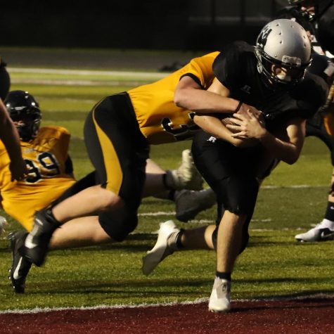 Harlan Countys Gage Bailey, pictured in action earlier this season, ran for 100 yards and passed for 85 as the Bears fell 18-8 to Knox Central on Tuesday in Barbourville.
