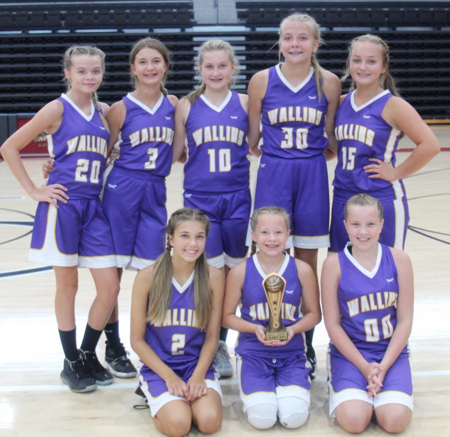 Wallins captured the championship of the Black Bears Preseason Tournament on Saturday at Harlan County High School. Team members include, from left, front row: Hailie Hensley, Kendall Brock and Aubrey Noe; back row: Preslee Hensley, Haley Johnson, Whitney Noe, Whitley Teague and Savannah Hill.