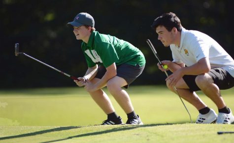 Harlans AIden Johnson and Middlesboros NIck Cox studied the course during a Pine Mountain Golf Conference match earlier this season.