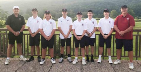 Harlan County won a team title on Tuesday in a Pine Mountain Golf Conference meet at the Wasioto Winds course in Pineville. Team members include, from left: assistant coach Brett Widner, Matt Lewis, Brayden Casolari, Alex Creech, Cole Cornett, Ethan Simpson, Evan Simpson and coach Greg Lewis.