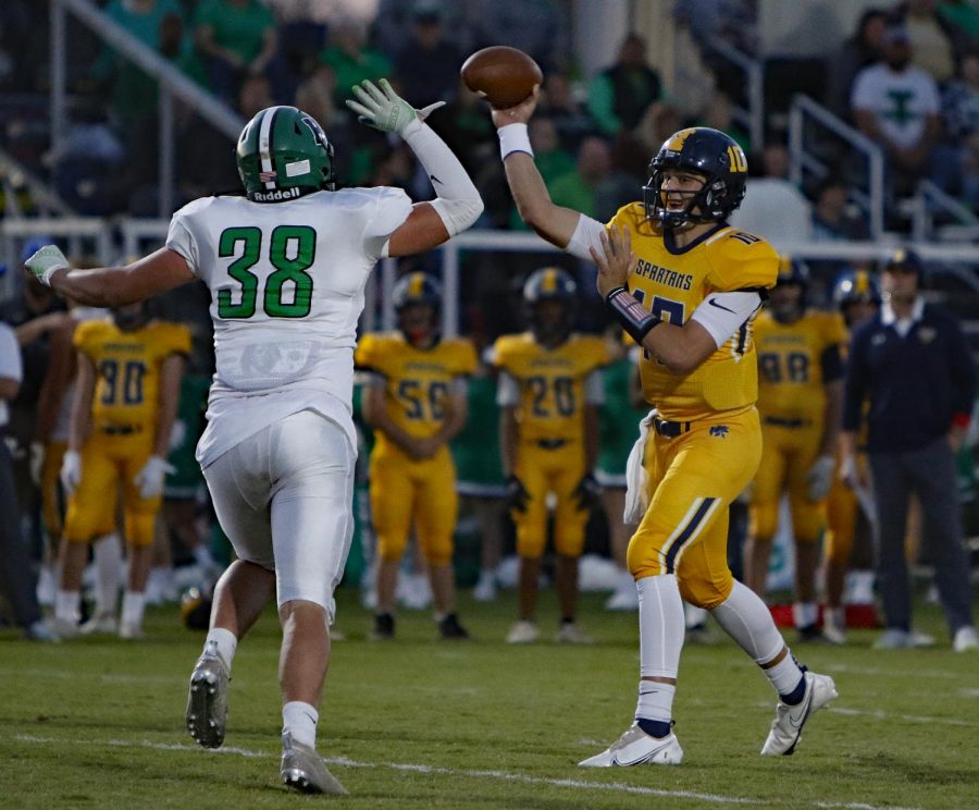 Sayre+quarterback+Cole+Pennington%2C+who+will+play+his+college+football+at+Marshall%2C+threw+for+a+pair+of+touchdowns+on+Friday+in+a+42-0+win+over+visiting+Harlan.