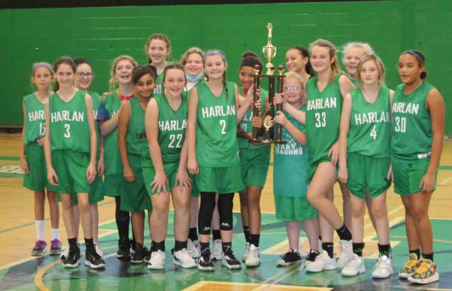 The Harlan Lady Dragons won the 13th Region All A Classic league title on Saturday with a 40-24 victory over Pineville to complete a perfect season.