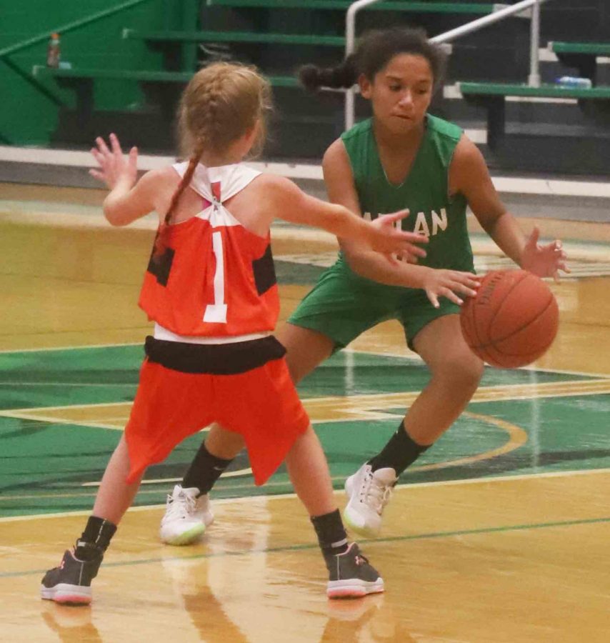 Harlans Addyson Patton worked around a Williamsburg defender in Mondays fifth- and sixth-grade game.