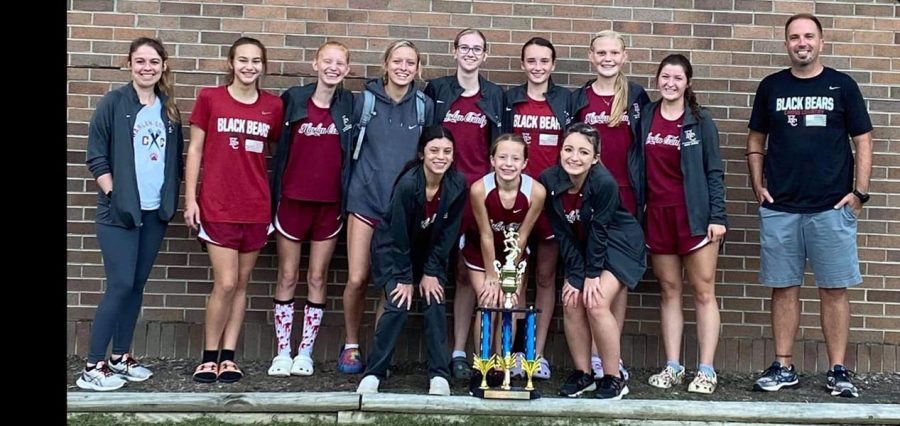 The Harlan County girls won the Southeastern Kentucky Conference meet on Tuesday at Bell County High School. Team members include, from left, front row: Aliyah Deleon, Kendall Brock and Lainey Garrett; back row: assistant coach Miranda Epperson, Taylor Clem, Summer Farley, Peyton Lunsford, Olivia Kelly, Sophie Day, Leah Taulbee and Riley Key.