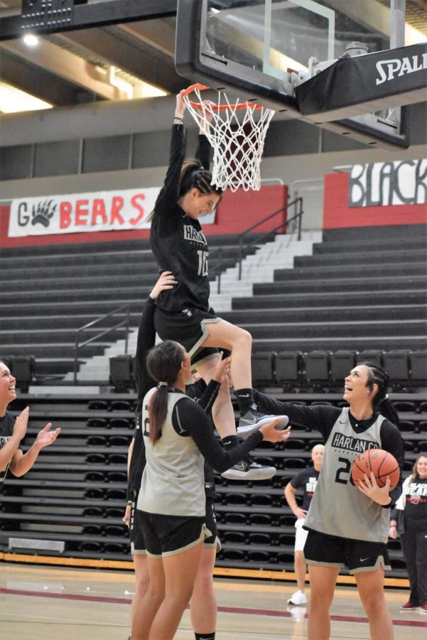 Harlan County senior guard Jaylin Preston received some help during the dunk competition Friday as part of Black Bear Madness.