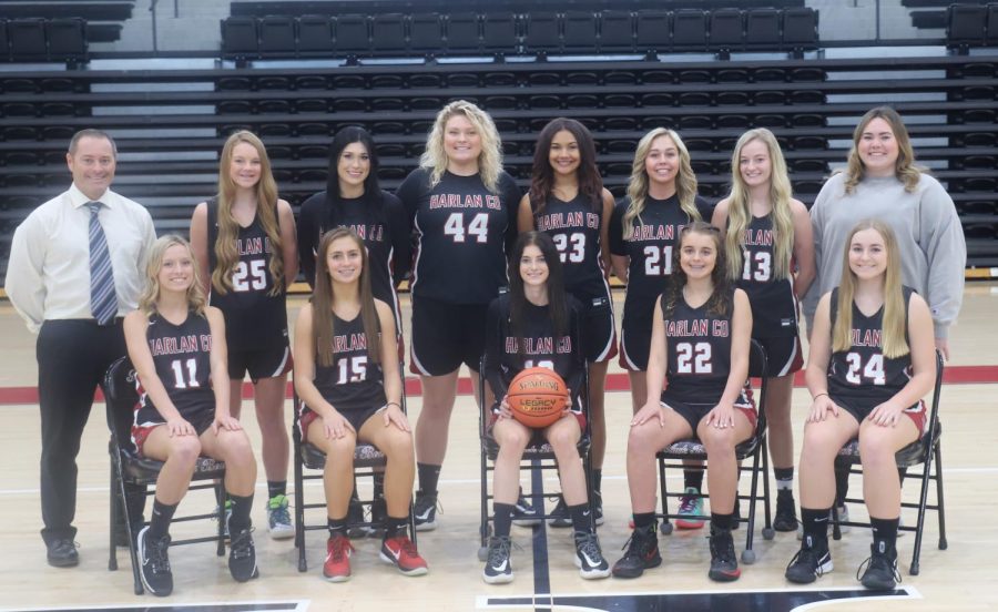 Team members include, from left, front row: Peyton Lunsford, Ella Karst, Jaylin Preston, Kylie Jones and Brianna Howard; back row: coach Anthony Nolan, Cheyenne Rhymer, Jaylin Smith, Taylor Lunsford, Paige Phillips, Hailey Austin, Taytum Griffin and assistant coach Breann Turner.