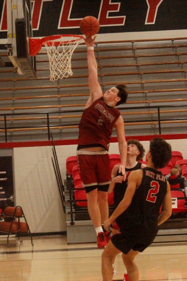 Harlan Countys Trent Noah sailed to the basket in scrimmage action Monday. Noah poured in 43 points in an 87-70 win.