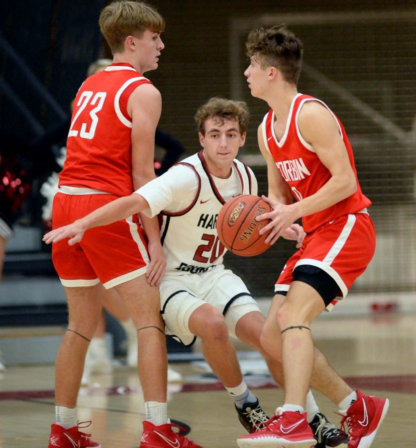 Harlan County guard Jackson Huff battled through Eli Pietrowskis pick to guard Hayden Llewellyn in Mondays game. Huff scored 12 points in the Black Bears 78-56 victory over visiting Corbin.