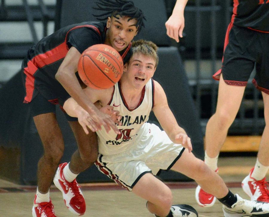 Harlan Countys Jonah Swanner battled with Lakota Wests William Layfield for a loose ball in the championship game of the Harlan County Hoops Extravaganza on Wednesday. Layfield led Lakota West with 22 points. Swanner had 15 for the Bears, who won 87-72 to improve to 10-3 on the season.