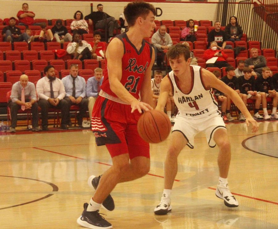 Harlan Countys Daniel Carmical, pictured against Rockcastle Countys Daniel Mulins, hit six 3-pointers and scored 18 points on Saturday in the Bears win during the Ted Cook Classic.