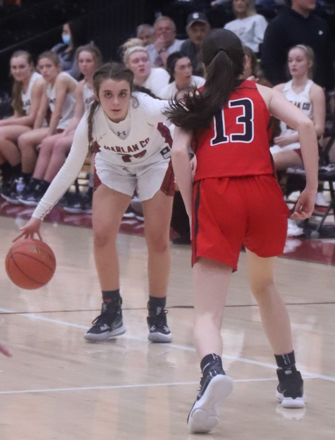 Harlan County guard Kylie Jones looked for an opening against Whitley Countys Kaytlynn Collins on Tuesday. Jones hit three early 3-pointers to help HCHS take an early lead on the way to a 64-53 win.