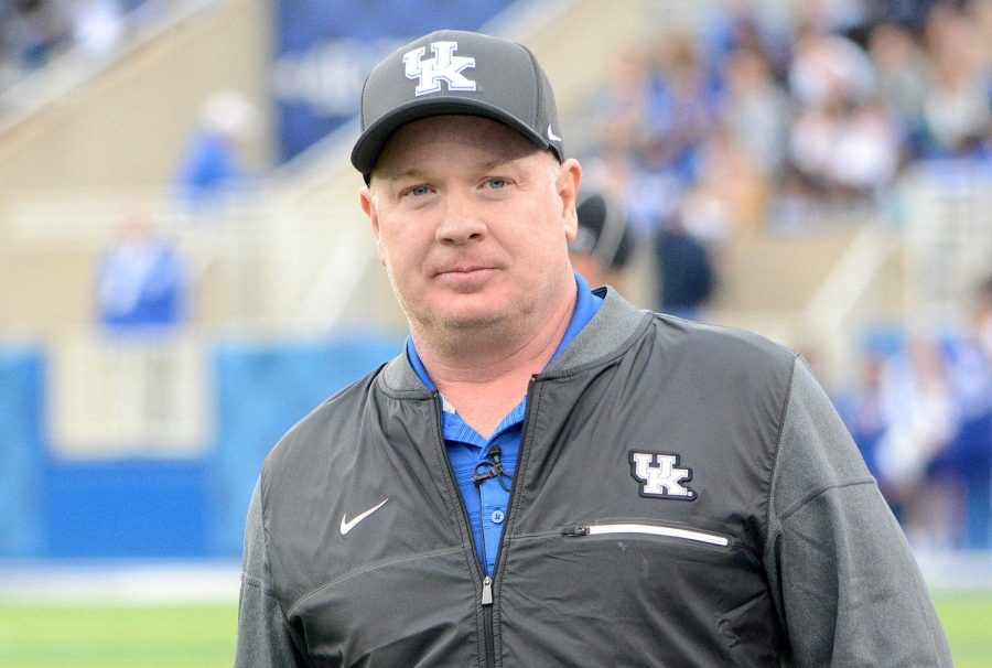 Kentucky football coach Mark Stoops played his college football at Iowa.