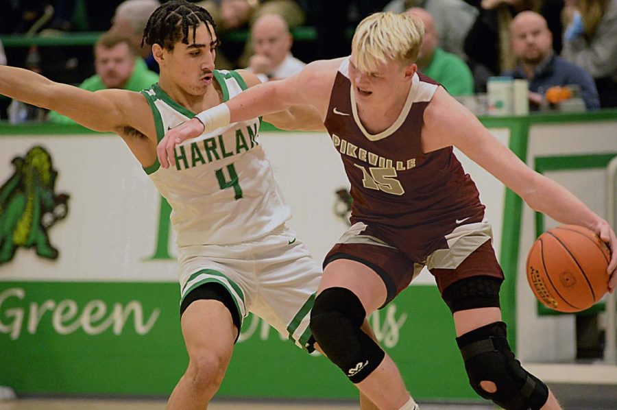 Pikeville guard Rylee Samons worked down the court against Harlans Kaleb McLendon in Tuesdays game. Samons scored 10 points as the Panthers improved to 11-1 with a 64-60 victory.