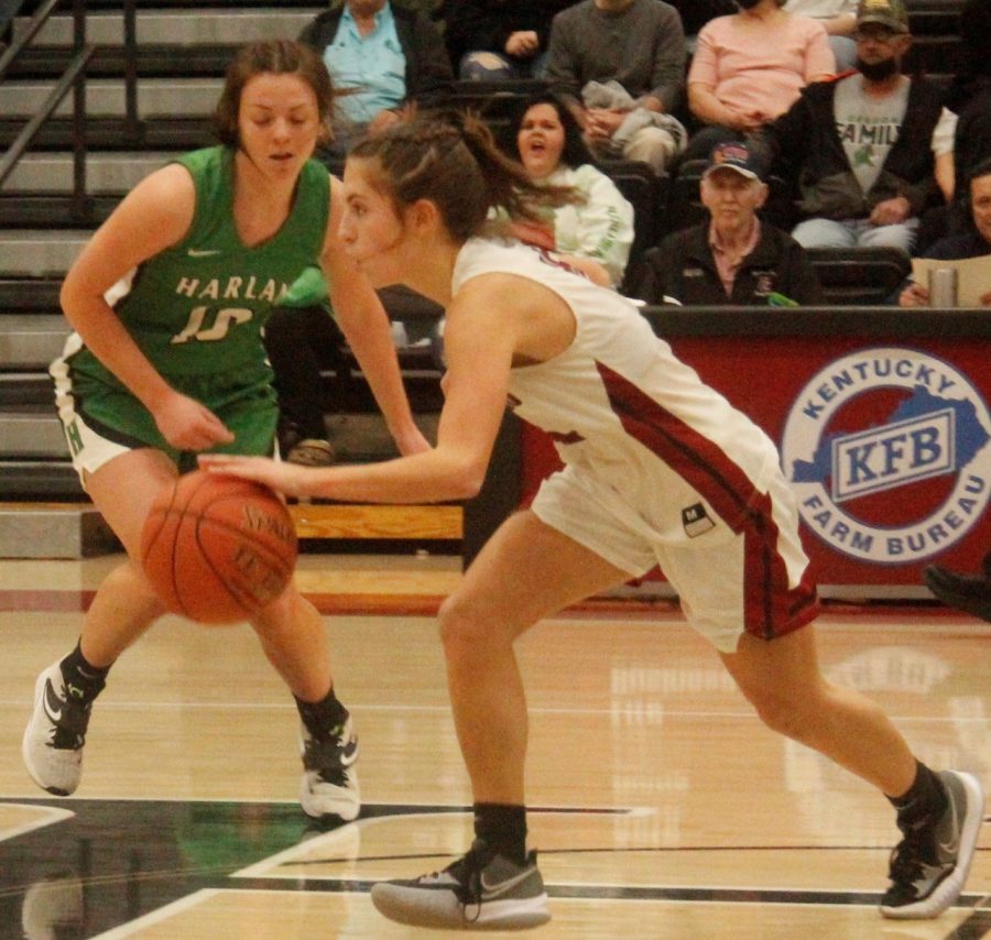 Ella Karst score 18 points as Harlan County defeated Harlan on Saturday.
