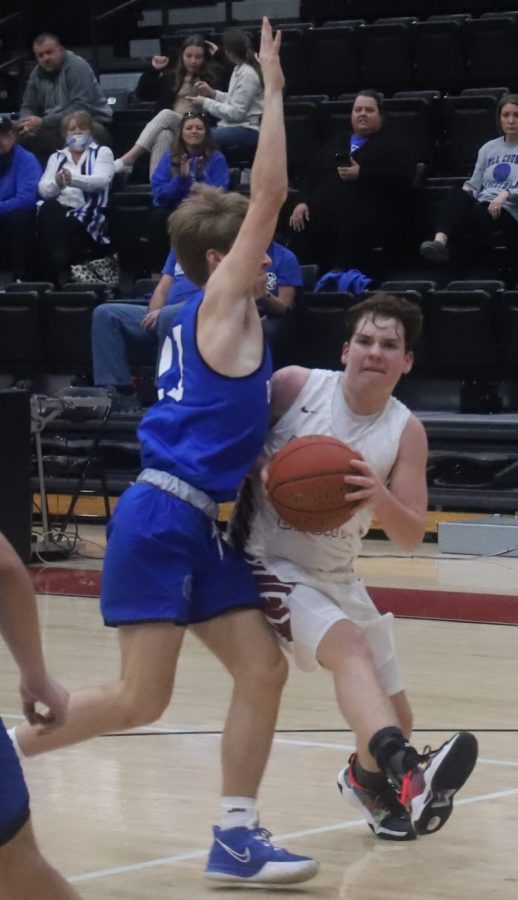 Ethan Simpson drove to the basket in tournament action Monday.