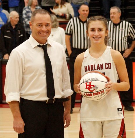 Harlan County sophomore guard Ella Karst was honored before Tuesdays game against Bell County for scoring her 1,000th point earlier this season during a game on Dec. 17 at Bell County.