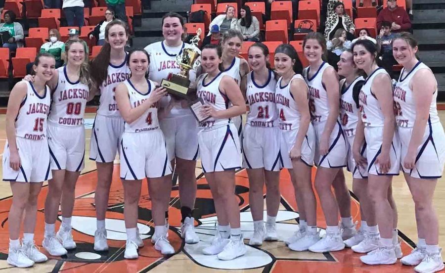 The Jackson County Lady Generals are pictured with the championship trophy after winning the 13th Region All A Classic title on Thursday.