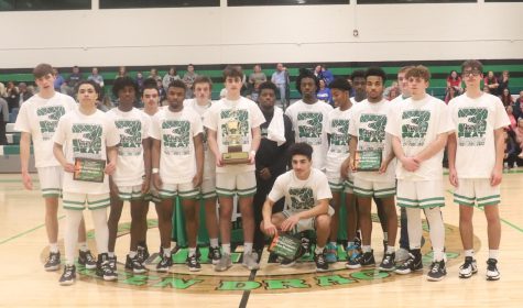 The Harlan Green Dragons are pictured with the championship trophy after rolling past Barbourville 78-55 in the 13th Region All A Classic finals on Tuesday. Harlan will advance to state competition at Eastern Kentucky University.