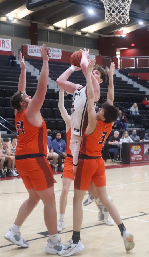 Harlan County guard Trent Noah was surrounded by Madison Southern defenders throughout Fridays game. THe visiting Eagles won 60-58 despite 24 points from Noah.
