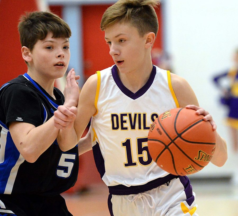 Wallins Tanner Daniels, pictured in first-round action Saturday, scored 30 points on Monday in the Purple Devils 57-47 win over Evarts in the semifinals.