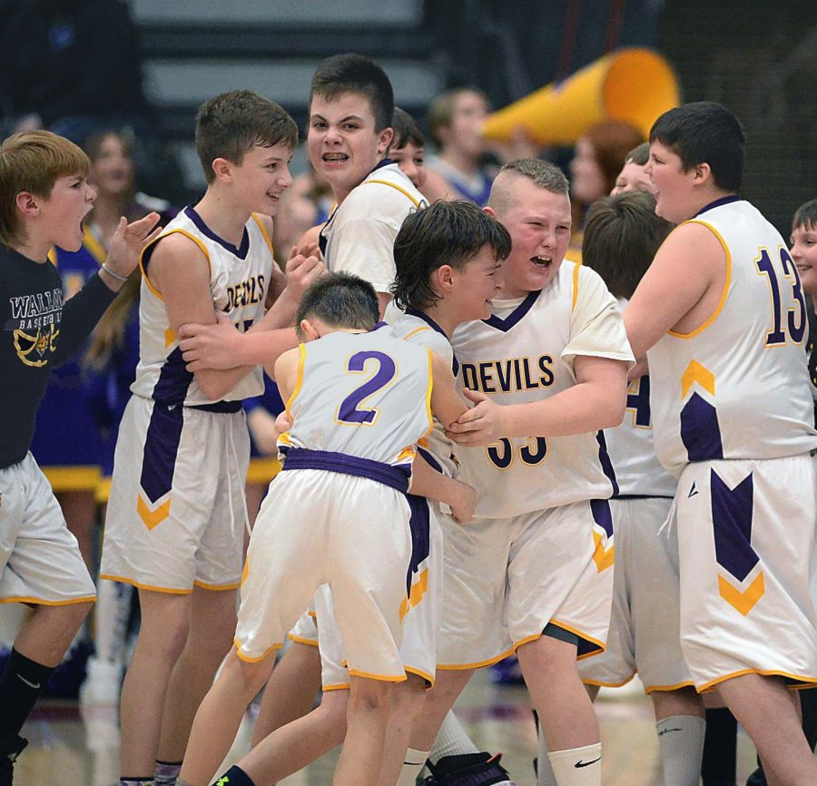 The Wallins Purple Devils celebrated their championship game win over Rosspoint on Saturday in the fifth- and sixth-grade county tournament finals at Harlan County High School.
