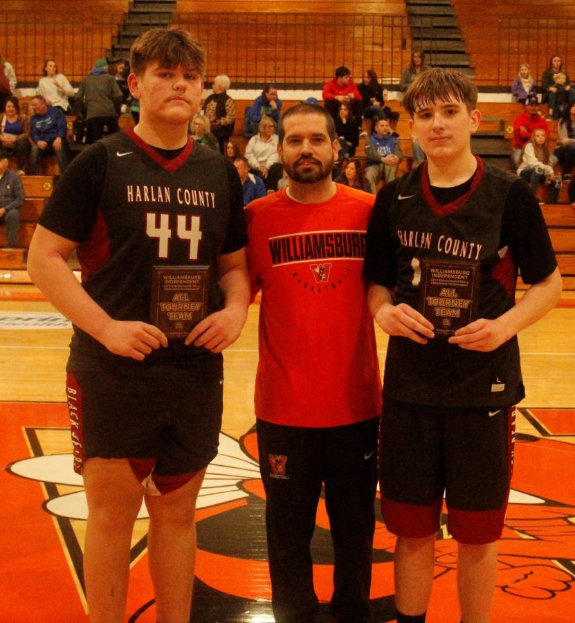 Jaycee Carter (left) and Brody Napier were named to the all-tournament team on Saturday in the 13th Region Freshman Tournament. The two HCHS players received their plaques from Williamsburg coach Eric Swords, the tournament manager.