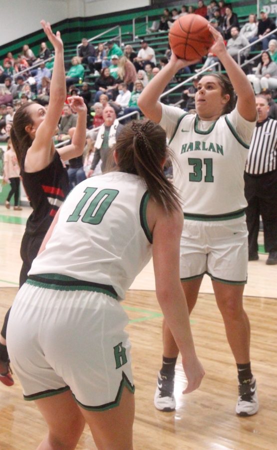 Harlan freshman wing Leah Davis put up a shot during the Lady Dragons victory over Red Bird. Harlan broke a seven-game losing streak with the win.