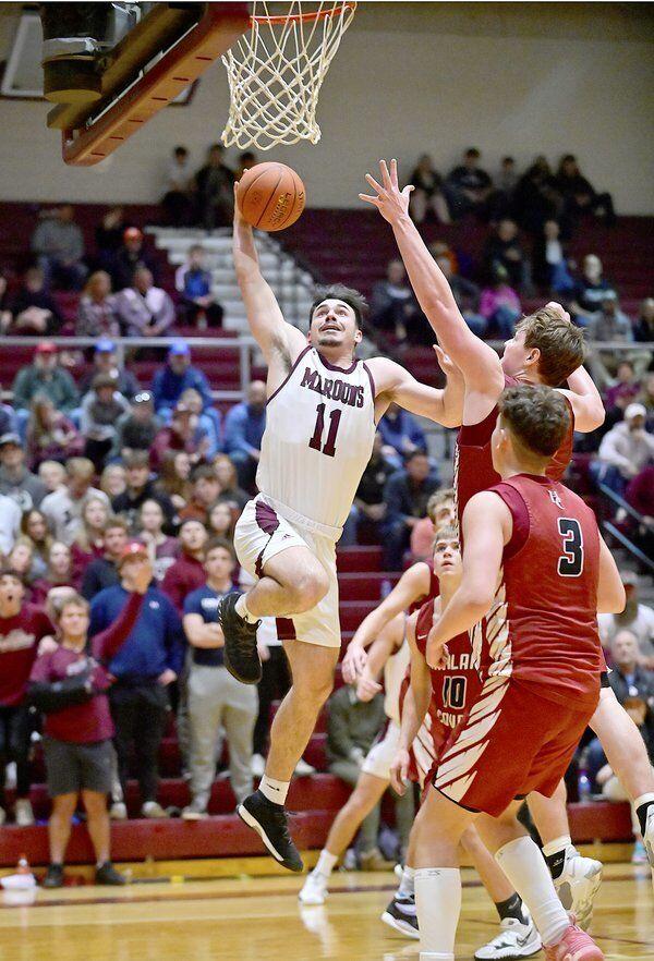 Pulaski+County+High+School+senior+Zach+Travis+scored+a+game-high+30+points+in+the+undefeated+Maroons+victory+over+Harlan+County+High+School+on+Tuesday+night.