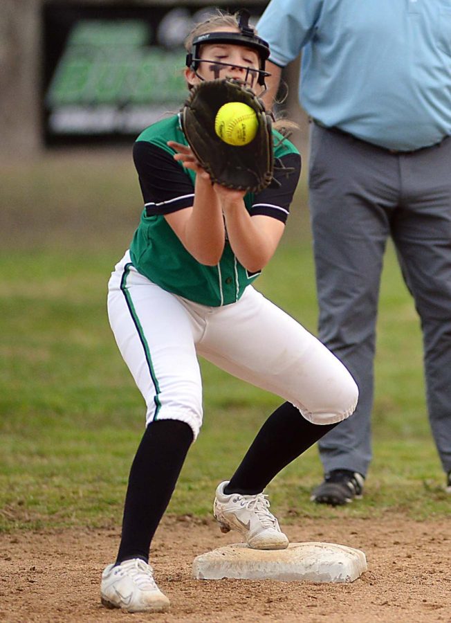 Harlans Mallow McNiel took a throw at second base in action earlier this season. McNiel had a hit Thursday in the Lady Dragons win at Leslie County.