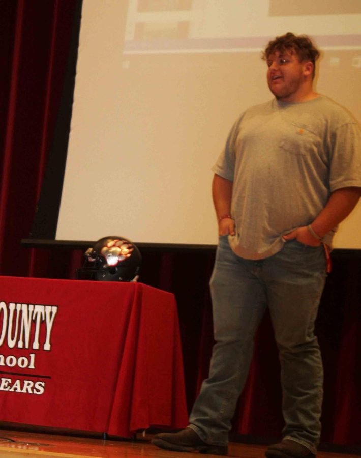 HCHS junior lineman Connor Blevins talkied to eighth-graders on Thursday during a program welcoming them to the team.
