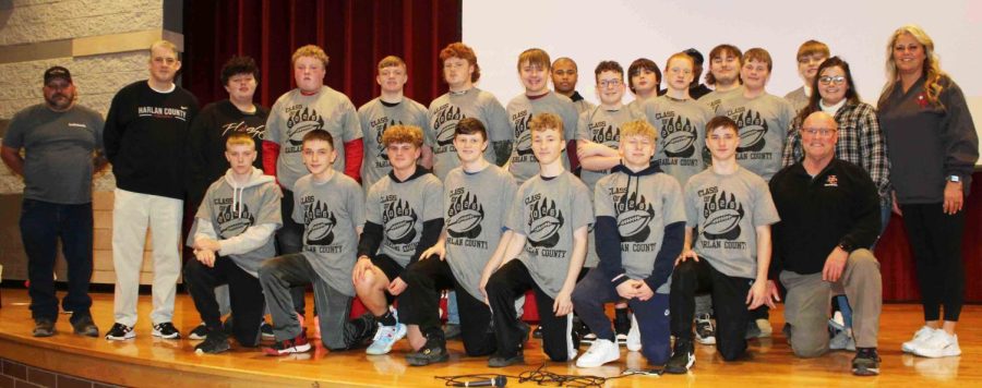Eighth-grade football players were welcomed to the Harlan County High School football team during the HCHS Signing Day program Thursday. Those pictured include, from left, front row: Garrett Wilder, Landon Cook, Chance Sturgill, Dillan Clem, Jason Maggard, Tyler Gross, Jayce Brown and coach Amos McCreary; middle row: coach Dion Coldiron, coach Petie Dean, T.J. Cook, Tobby Webb, Brody Hensley, Brayden Smith, Braxton Cornett, Jacob Howard, Brayden Fultz, Josh Stewart, Lacey Sanders and Astria Howard; back row: Shemar Carr, Blake Short, coach Lenny Carr, Brayden Clay and Aaron Johnson.