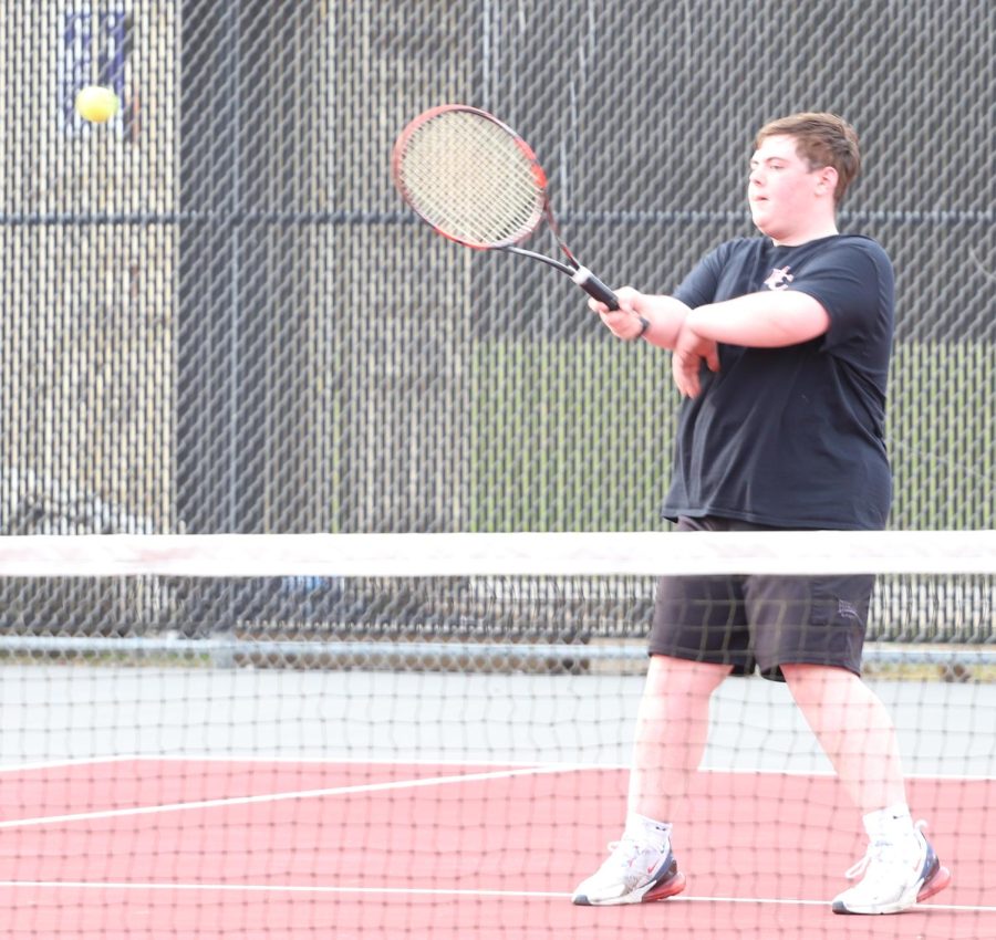 Harlan County senior Sawyer Cornett is pictured during a match Tuesday against visiting Barbourville.