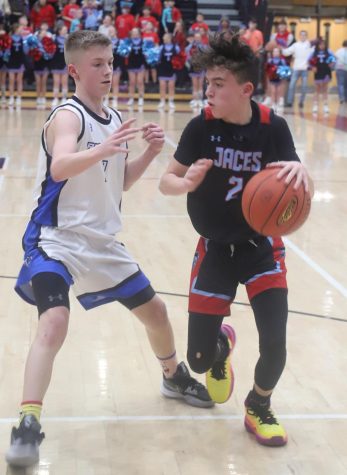 James A. Cawoods Kaden Jones, pictured in action last season, scored 16 points as the Trojans opened the 2022-2023 season with a win at Mountain View.