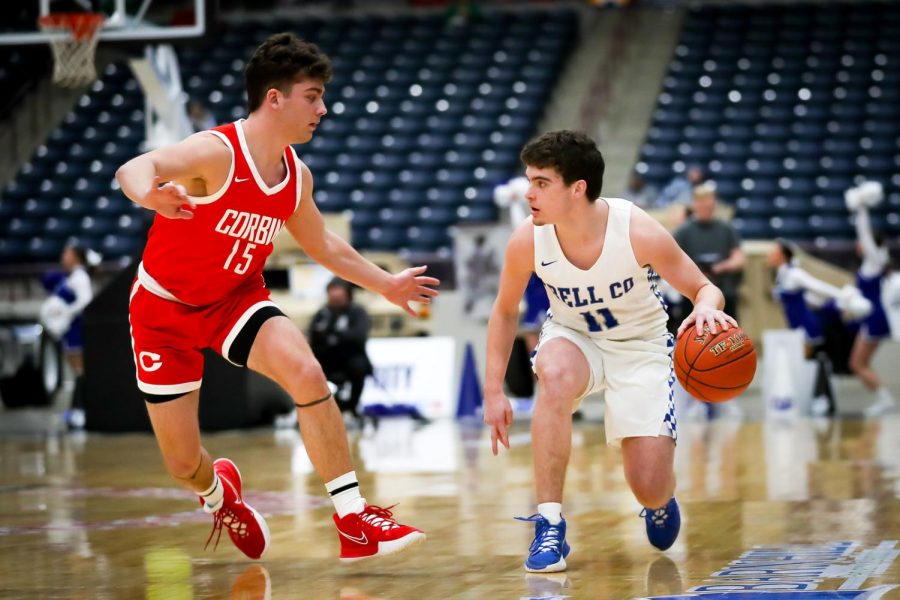 Bell County guard Hayden Callebs worked down the court against Corbins Brody Wells in 13th Region Tournament action Thursday.