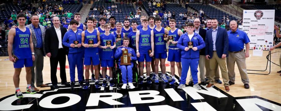 The North Laurel Jaguars are pictured with the championship trophy after their 69-56 win Monday over Knox Central.