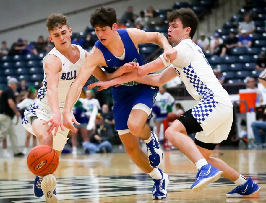 North Laurel guard Reed Sheppard split Bell Countys Carter McCune and Dawson Woolum during the 13th Region Tournament semifinals on Saturday. Sheppard scored 36 points in the Jaguars 59-40 victory.