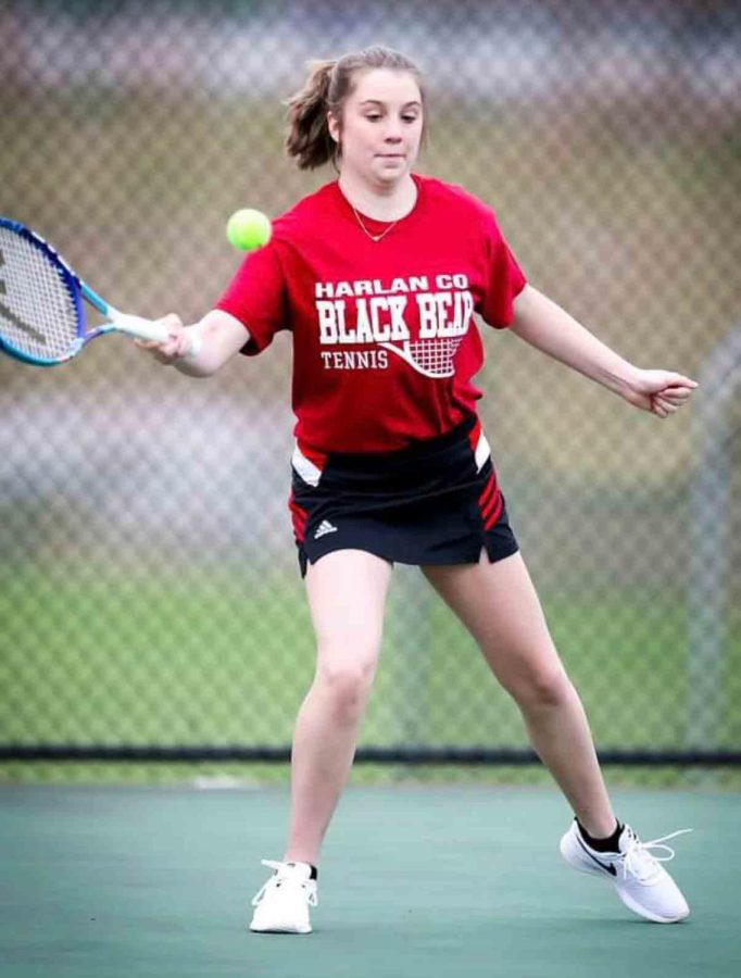 Harlan+Countys+Hailey+Gaw%2C+pictured+in+action+earlier+this+season%2C+was+an+8-0+winner+Tuesday+in+her+match+at+Williamsburg.